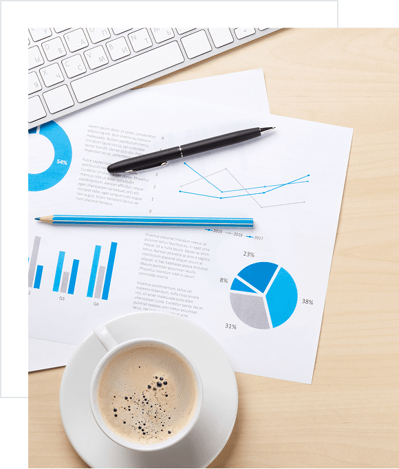 Coffee and documents on office desk